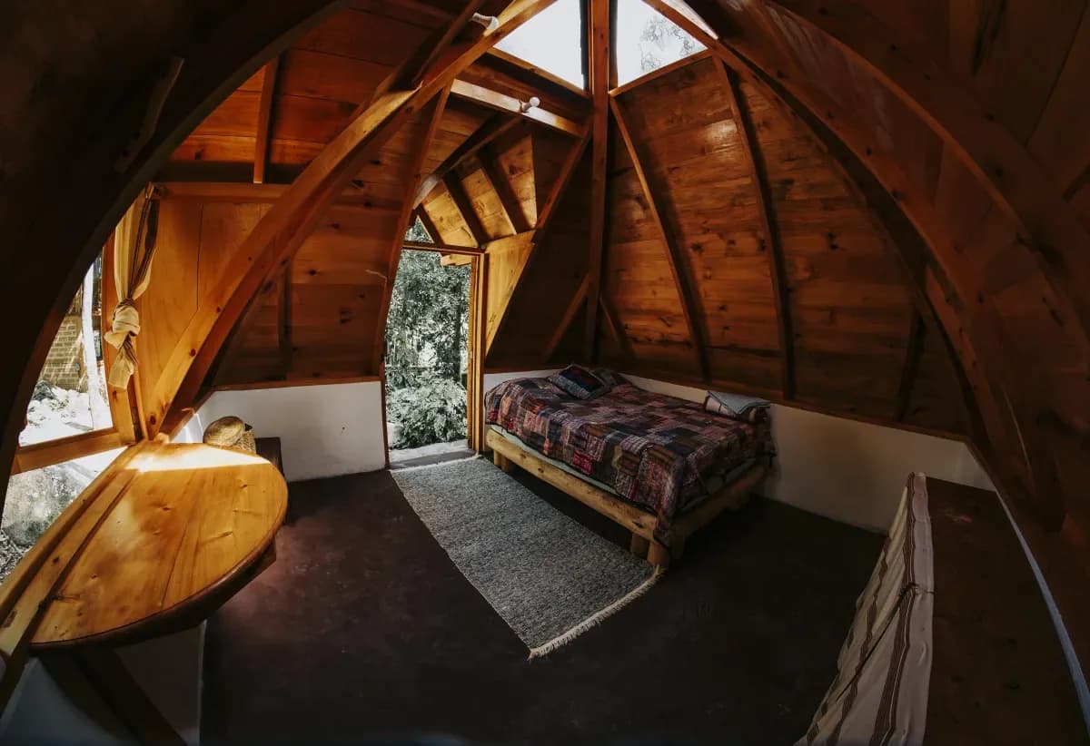 Wood-lined interior of a pyramid accommodation at Maestro Valley