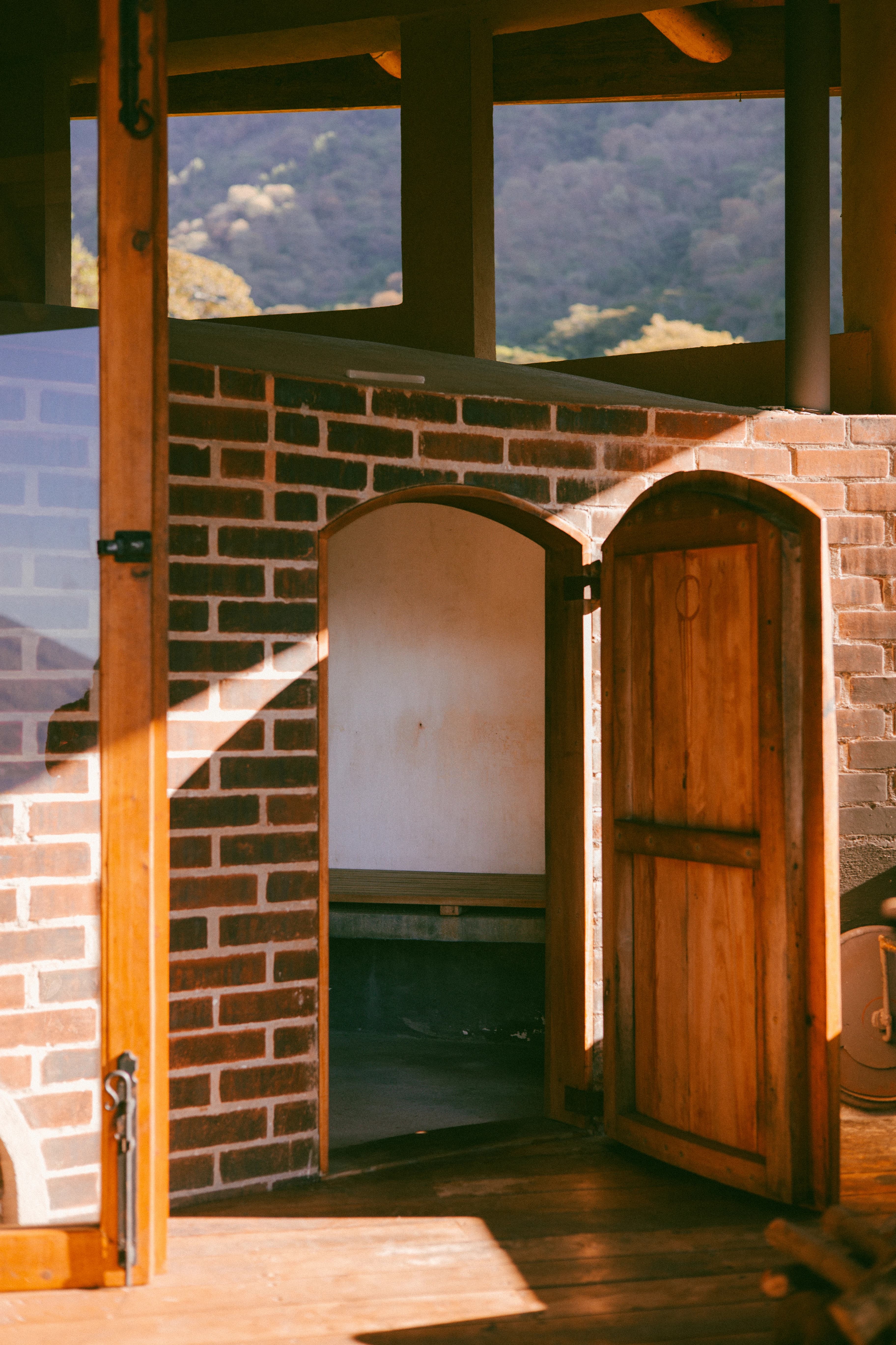 Sunlight falling across the brick temazcal at Maestro Valley